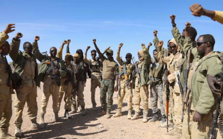 Why did massive gunfire happen near the regional military base?